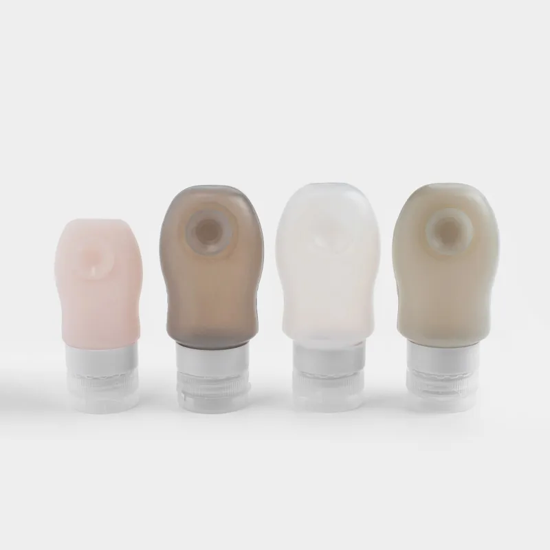 Саяхатқа арналған құтылар жиынтығы, 4 дана, сорғыш шыныаяқта, косметикалық сөмкеде, силикон, Travel color